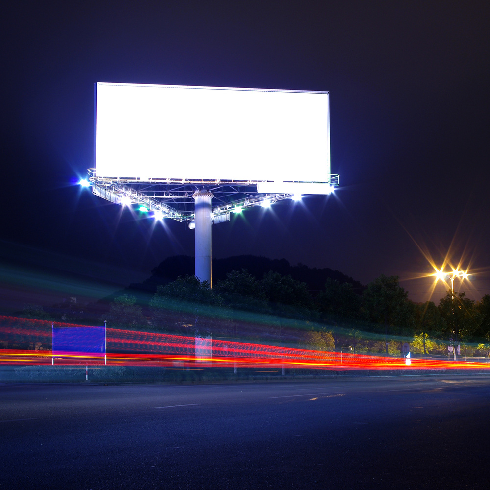 Night highway billboard